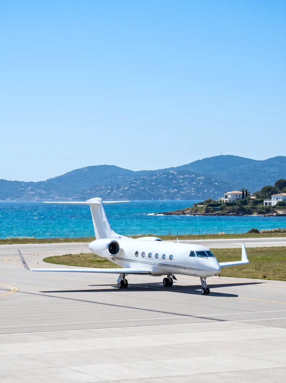 Mediterranean summer: salt, sand and UV on business-jet paint, and the seasonal program that beats them